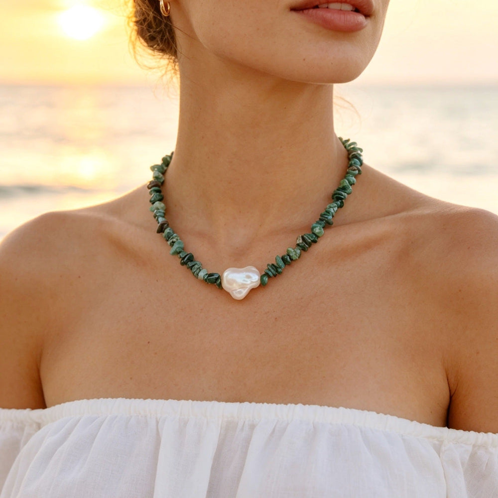 Green beaded necklace with pearl accents